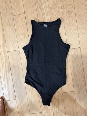 SKIMS Black Sleeveless One-Piece Bodysuit